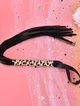 BDSM leather black whip, straps and handle with leopard pattern
