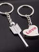 Kľúčenky pre dvoch, šíp a srdce, číry zirkón a nápis "Love"