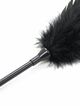 Black feather tickler with a green sheen, leather slapper
