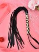 BDSM leather black whip, straps and handle with leopard pattern