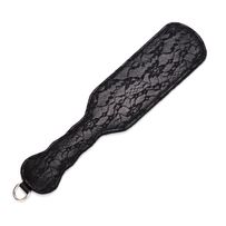 BDSM plácačka, černá barva, krajka, květinový vzor