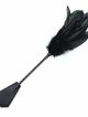 Black feather tickler with a green sheen, leather slapper
