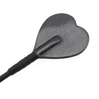 Black leather whip with red heart, leather handle