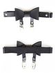 Leather garter on the leg, black leather and bow