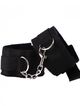 Handcuffs, hairy black fur and straps