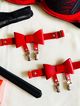 Leather garter leg, red color and bow