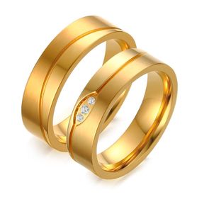Svadobná obrúčka pre ženu, zlatá farba, vlnka, číre zirkóny, oceľ