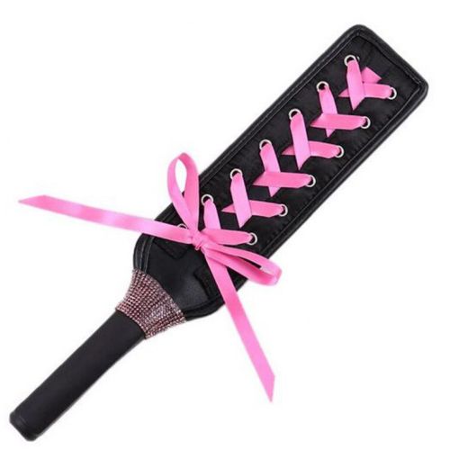 BDSM slapper, black leather, pink ribbon and zircons