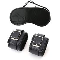 Erotic set, leather handcuffs and satin mask, black color