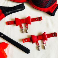 Leather garter leg, red color and bow